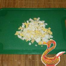 Russian salad of salted herring with apple