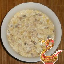 Russian salad of salted herring with apple