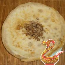 Russian bliny stuffed with meat recipe with photo