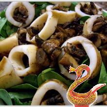 Кальмары, тушеные с шампиньонами