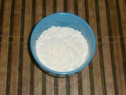 tall glass of wheat flour