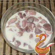 Pork braised in milk
