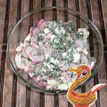 Russian salad with ham and radish
